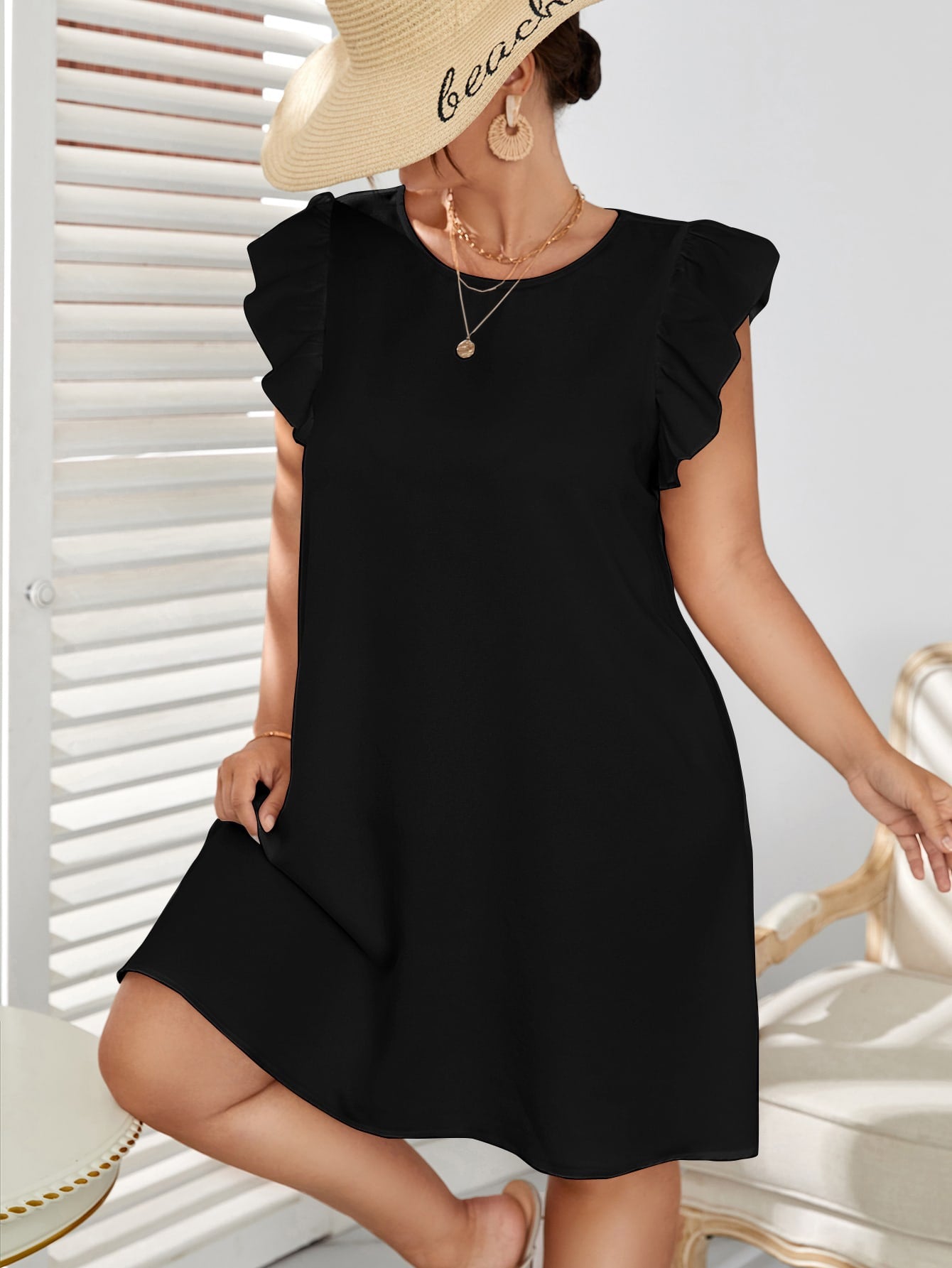 # 1961 Ruffle Sleeve Tunic Dress