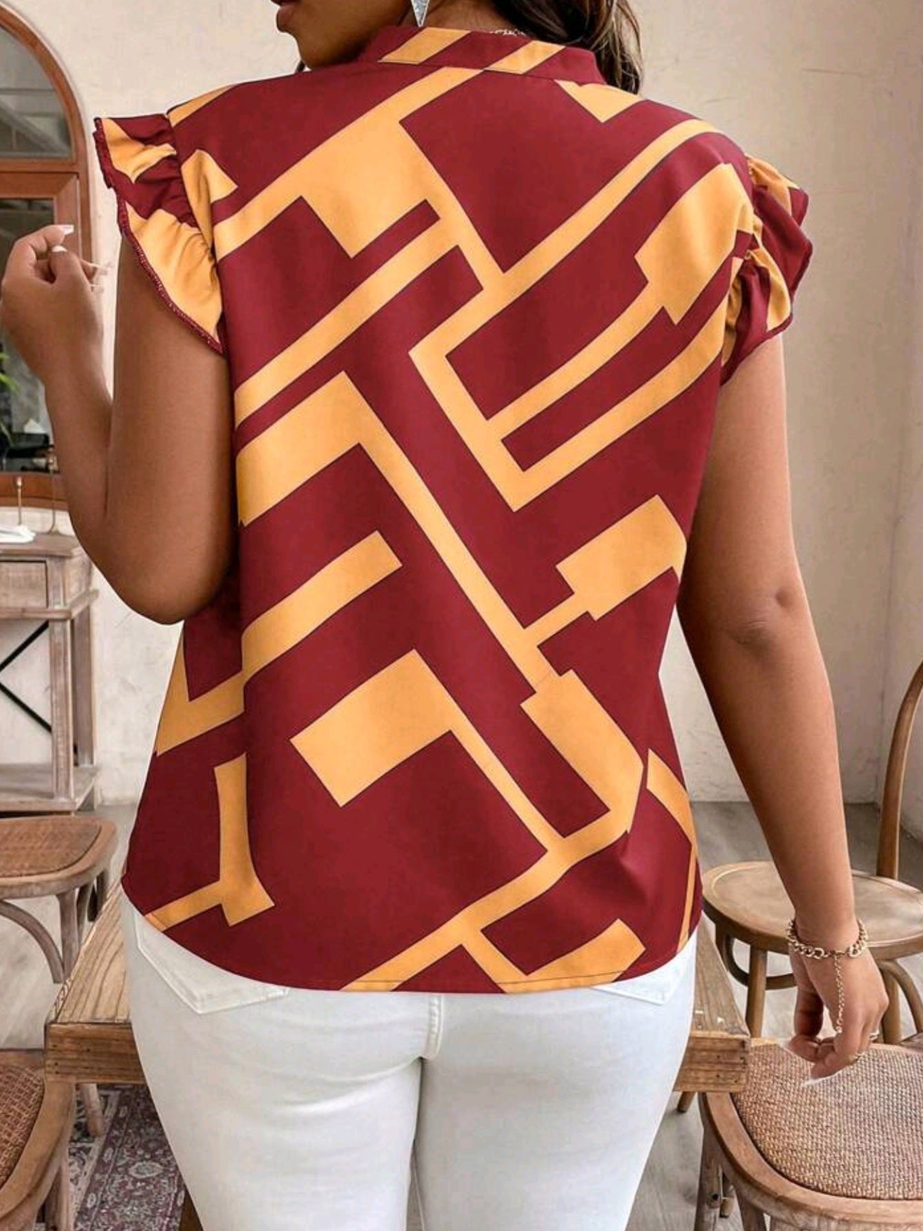 #7441 Notched V-Neck Ruffle Hem Shirt
