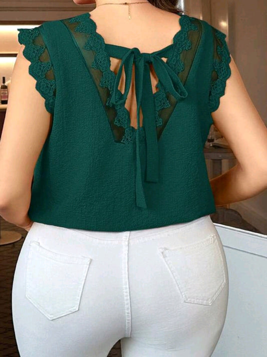 9381 Loose Blouse With Back Knot And Short Flutter Sleeves